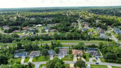 This newly remodeled 3-bedroom, 3-bathroom home in the desirable on The Grand Club - Pine Lakes Course in Florida - for sale on GolfHomes.com, golf home, golf lot