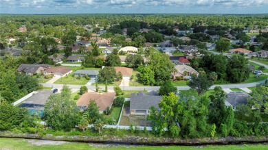 This newly remodeled 3-bedroom, 3-bathroom home in the desirable on The Grand Club - Pine Lakes Course in Florida - for sale on GolfHomes.com, golf home, golf lot