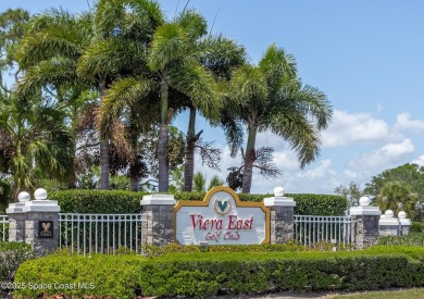 Welcome to your dream home! Nestled on a prestigious Viera East on Viera East Golf Club in Florida - for sale on GolfHomes.com, golf home, golf lot