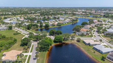 Welcome to your dream home! Nestled on a prestigious Viera East on Viera East Golf Club in Florida - for sale on GolfHomes.com, golf home, golf lot