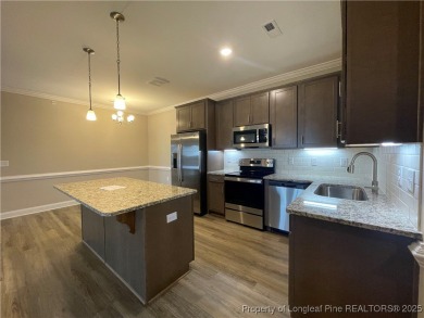 This beautiful three bedroom, two bathroom luxury condo in on Anderson Creek Golf Club in North Carolina - for sale on GolfHomes.com, golf home, golf lot