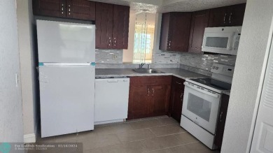 This lovely 2 Bedroom and 2 bathroom condo unit in a quiet on Oriole Golf and Tennis Club in Florida - for sale on GolfHomes.com, golf home, golf lot