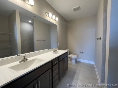This beautiful three bedroom, two bathroom luxury condo in on Anderson Creek Golf Club in North Carolina - for sale on GolfHomes.com, golf home, golf lot