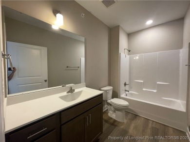 This beautiful three bedroom, two bathroom luxury condo in on Anderson Creek Golf Club in North Carolina - for sale on GolfHomes.com, golf home, golf lot