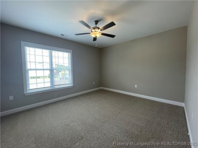 This beautiful three bedroom, two bathroom luxury condo in on Anderson Creek Golf Club in North Carolina - for sale on GolfHomes.com, golf home, golf lot