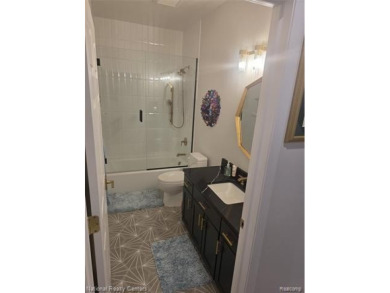 Stylish 2-Bedroom Condo with Modern Touches and Private Balcony on Fellows Creek Golf Club in Michigan - for sale on GolfHomes.com, golf home, golf lot