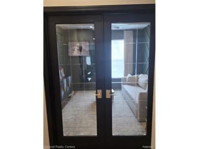 Stylish 2-Bedroom Condo with Modern Touches and Private Balcony on Fellows Creek Golf Club in Michigan - for sale on GolfHomes.com, golf home, golf lot