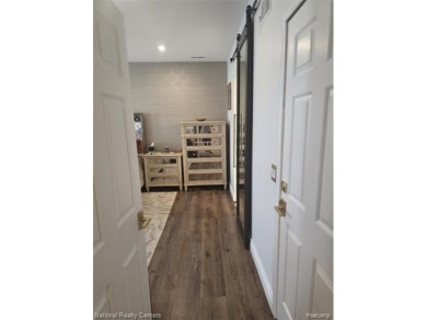 Stylish 2-Bedroom Condo with Modern Touches and Private Balcony on Fellows Creek Golf Club in Michigan - for sale on GolfHomes.com, golf home, golf lot