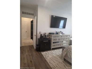 Stylish 2-Bedroom Condo with Modern Touches and Private Balcony on Fellows Creek Golf Club in Michigan - for sale on GolfHomes.com, golf home, golf lot