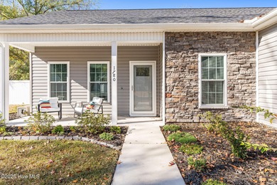 Welcome to your ideal coastal escape! This charming one-story on Sea Trail Golf Resort in North Carolina - for sale on GolfHomes.com, golf home, golf lot