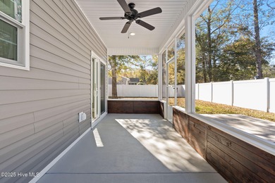 Welcome to your ideal coastal escape! This charming one-story on Sea Trail Golf Resort in North Carolina - for sale on GolfHomes.com, golf home, golf lot