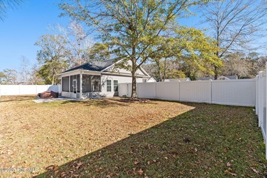 Welcome to your ideal coastal escape! This charming one-story on Sea Trail Golf Resort in North Carolina - for sale on GolfHomes.com, golf home, golf lot