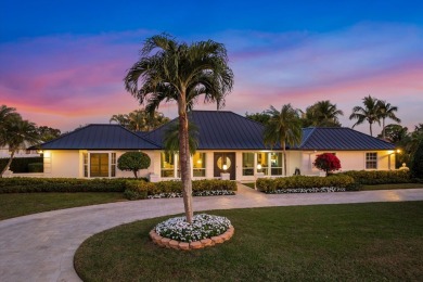 Nestled on an incredible 21,000 sq. ft. lot overlooking the on Atlantis Golf Club in Florida - for sale on GolfHomes.com, golf home, golf lot