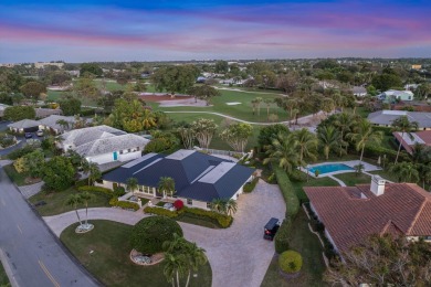 Nestled on an incredible 21,000 sq. ft. lot overlooking the on Atlantis Golf Club in Florida - for sale on GolfHomes.com, golf home, golf lot