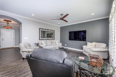 Introducing 16215 Lakeside Loop Lane - a meticulously maintained on The Peninsula Club in North Carolina - for sale on GolfHomes.com, golf home, golf lot