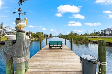 Enjoy stunning water views from nearly every angle of this on Rotonda Golf and Country Club - Long Marsh  in Florida - for sale on GolfHomes.com, golf home, golf lot