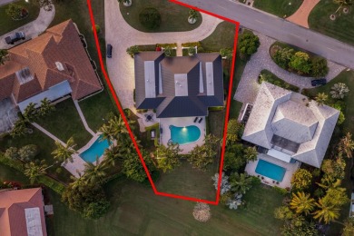 Nestled on an incredible 21,000 sq. ft. lot overlooking the on Atlantis Golf Club in Florida - for sale on GolfHomes.com, golf home, golf lot