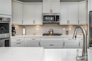 Introducing 16215 Lakeside Loop Lane - a meticulously maintained on The Peninsula Club in North Carolina - for sale on GolfHomes.com, golf home, golf lot
