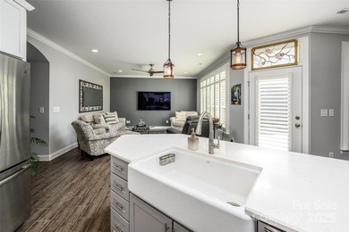 Introducing 16215 Lakeside Loop Lane - a meticulously maintained on The Peninsula Club in North Carolina - for sale on GolfHomes.com, golf home, golf lot