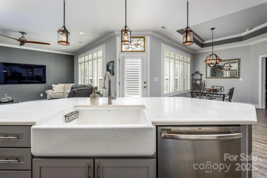 Introducing 16215 Lakeside Loop Lane - a meticulously maintained on The Peninsula Club in North Carolina - for sale on GolfHomes.com, golf home, golf lot