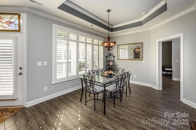Introducing 16215 Lakeside Loop Lane - a meticulously maintained on The Peninsula Club in North Carolina - for sale on GolfHomes.com, golf home, golf lot