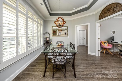 Introducing 16215 Lakeside Loop Lane - a meticulously maintained on The Peninsula Club in North Carolina - for sale on GolfHomes.com, golf home, golf lot