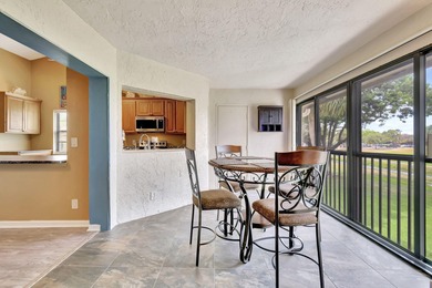 Exceptional updated corner unit with the most fabulous golf on The Links At Boynton Beach - The Family Course in Florida - for sale on GolfHomes.com, golf home, golf lot