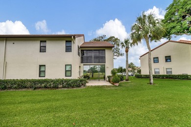 Exceptional updated corner unit with the most fabulous golf on The Links At Boynton Beach - The Family Course in Florida - for sale on GolfHomes.com, golf home, golf lot