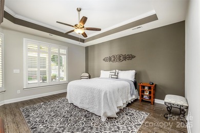 Introducing 16215 Lakeside Loop Lane - a meticulously maintained on The Peninsula Club in North Carolina - for sale on GolfHomes.com, golf home, golf lot