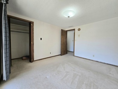 Nestled on a quiet cul-de-sac overlooking the 10th green of on Smoky Hill Country Club in Kansas - for sale on GolfHomes.com, golf home, golf lot