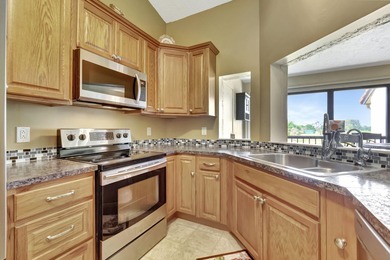 Exceptional updated corner unit with the most fabulous golf on The Links At Boynton Beach - The Family Course in Florida - for sale on GolfHomes.com, golf home, golf lot