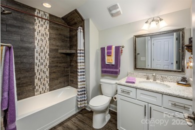 Introducing 16215 Lakeside Loop Lane - a meticulously maintained on The Peninsula Club in North Carolina - for sale on GolfHomes.com, golf home, golf lot