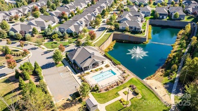 Introducing 16215 Lakeside Loop Lane - a meticulously maintained on The Peninsula Club in North Carolina - for sale on GolfHomes.com, golf home, golf lot