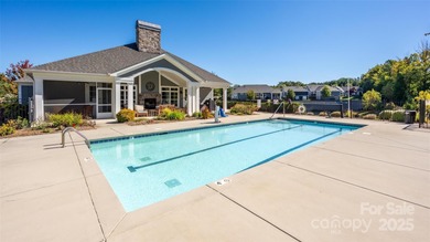 Introducing 16215 Lakeside Loop Lane - a meticulously maintained on The Peninsula Club in North Carolina - for sale on GolfHomes.com, golf home, golf lot