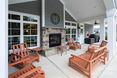 Introducing 16215 Lakeside Loop Lane - a meticulously maintained on The Peninsula Club in North Carolina - for sale on GolfHomes.com, golf home, golf lot