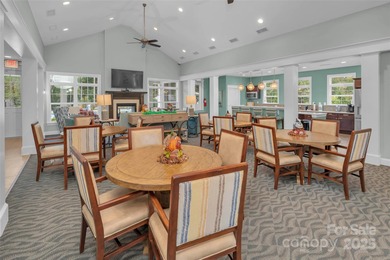 Introducing 16215 Lakeside Loop Lane - a meticulously maintained on The Peninsula Club in North Carolina - for sale on GolfHomes.com, golf home, golf lot