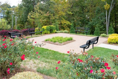 Introducing 16215 Lakeside Loop Lane - a meticulously maintained on The Peninsula Club in North Carolina - for sale on GolfHomes.com, golf home, golf lot