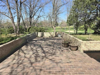 Nestled on a quiet cul-de-sac overlooking the 10th green of on Smoky Hill Country Club in Kansas - for sale on GolfHomes.com, golf home, golf lot