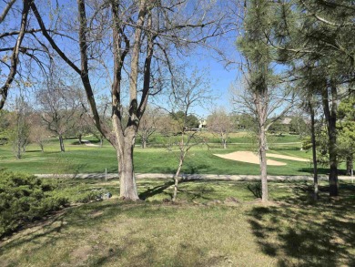 Nestled on a quiet cul~de~sac overlooking the 10th green of on Smoky Hill Country Club in Kansas - for sale on GolfHomes.com, golf home, golf lot