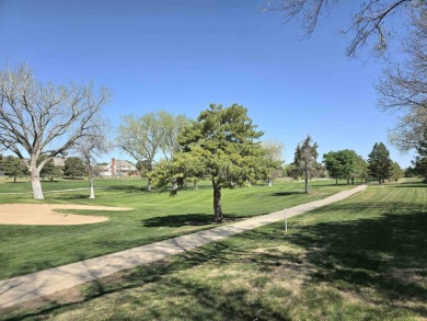 Nestled on a quiet cul~de~sac overlooking the 10th green of on Smoky Hill Country Club in Kansas - for sale on GolfHomes.com, golf home, golf lot