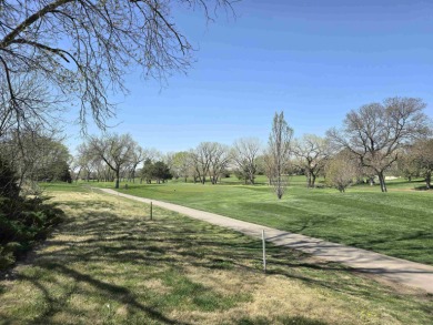 Nestled on a quiet cul~de~sac overlooking the 10th green of on Smoky Hill Country Club in Kansas - for sale on GolfHomes.com, golf home, golf lot
