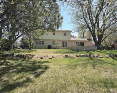 Nestled on a quiet cul~de~sac overlooking the 10th green of on Smoky Hill Country Club in Kansas - for sale on GolfHomes.com, golf home, golf lot
