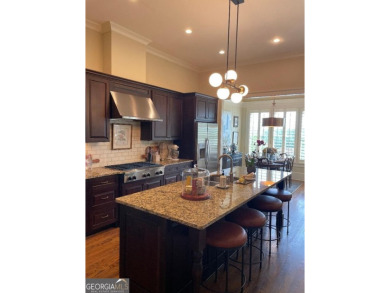 Showcase listing in the gated townhomes in Windermere Golf & on Windermere Golf Club in Georgia - for sale on GolfHomes.com, golf home, golf lot