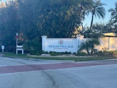 This is a ground-level condo nestled on a golf course in the on Ocean Village Golf Course in Florida - for sale on GolfHomes.com, golf home, golf lot