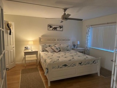 This is a ground-level condo nestled on a golf course in the on Ocean Village Golf Course in Florida - for sale on GolfHomes.com, golf home, golf lot