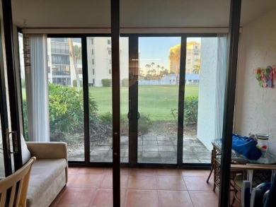 This is a ground-level condo nestled on a golf course in the on Ocean Village Golf Course in Florida - for sale on GolfHomes.com, golf home, golf lot