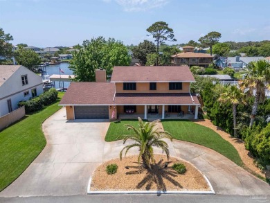 Take a look at this rare and beautifully maintained waterfront on Tiger Point Golf and Country Club in Florida - for sale on GolfHomes.com, golf home, golf lot