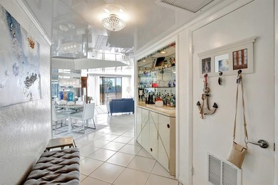 STEP INTO SUNSHINE AND SPACE... This oversized 1,607 sq ft on Inverrary Country Club in Florida - for sale on GolfHomes.com, golf home, golf lot