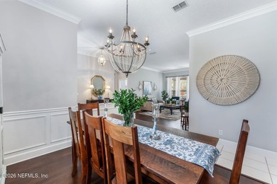 Tucked along a tranquil lagoon inside the prestigious on Jacksonville Golf and Country Club in Florida - for sale on GolfHomes.com, golf home, golf lot