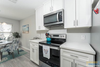 Beautifully updated and tastefully furnished townhome in the on South Padre Island Golf Club in Texas - for sale on GolfHomes.com, golf home, golf lot